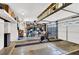 Spacious garage for parking, with a bicycle and gym equipment at 2020 Rainbow View St, Henderson, NV 89012