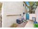 Image shows the pool equipment including the pump and filter system, along the side of the house at 2020 Rainbow View St, Henderson, NV 89012