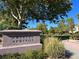 The Crystal Springs neighborhood sign sits in a lush green park at 2020 Rainbow View St, Henderson, NV 89012