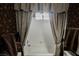 Clean and functional bathroom with a bathtub and shower combination at 2050 W Warm Springs Rd # 4322, Henderson, NV 89014
