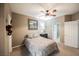 Neutral bedroom with a comfortable bed, decorative accents, and an adjoining bathroom at 2050 W Warm Springs Rd # 4322, Henderson, NV 89014