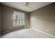 Bedroom featuring neutral carpet and a ceiling fan at 2050 W Warm Springs Rd # 4322, Henderson, NV 89014