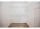 Walk-in closet with white wire shelving and neutral carpet at 2050 W Warm Springs Rd # 4322, Henderson, NV 89014