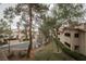 A charming street view showcases well-maintained landscaping and the building's architectural details at 2050 W Warm Springs Rd # 4322, Henderson, NV 89014
