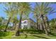 Stunning exterior view of this home, showcasing its architectural design, mature landscaping, and serene setting at 2050 W Warm Springs Rd # 4322, Henderson, NV 89014