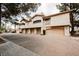Row of garages for condos, set off the street in a building with desert landscaping at 2050 W Warm Springs Rd # 4322, Henderson, NV 89014