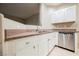View of the kitchen featuring stainless steel appliances and bright cabinets at 2050 W Warm Springs Rd # 4322, Henderson, NV 89014