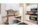 Stainless steel appliances, light counter tops and a deep stainless steel sink at 2050 W Warm Springs Rd # 4322, Henderson, NV 89014