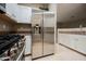 An eat-in kitchen featuring stainless steel appliances and tiled floors at 2050 W Warm Springs Rd # 4322, Henderson, NV 89014