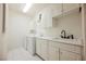 Bright laundry room featuring washer, dryer, and ample cabinet space at 2050 W Warm Springs Rd # 4322, Henderson, NV 89014