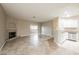 Neutral living area with fireplace, and sliding doors to patio at 2050 W Warm Springs Rd # 4322, Henderson, NV 89014