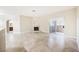 Living room featuring fireplace, access to balcony, and views to other rooms at 2050 W Warm Springs Rd # 4322, Henderson, NV 89014