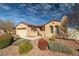 Inviting home featuring a neatly landscaped front yard, a pergola, and a desert-friendly design at 2648 E Sparrow Way, Pahrump, NV 89048