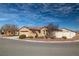 Charming single-story home with a well-maintained front yard, desert landscaping, and a two-car garage at 2648 E Sparrow Way, Pahrump, NV 89048