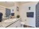 Stylish bathroom with granite counters, modern fixtures, and a decorative shower curtain at 2773 Frosted Teal Ave, North Las Vegas, NV 89086