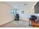Bright bedroom with neutral walls, carpet, and a window offering plenty of natural light at 2773 Frosted Teal Ave, North Las Vegas, NV 89086