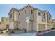 Contemporary two-story townhome with stucco siding, attached garages, and low-maintenance landscaping at 2773 Frosted Teal Ave, North Las Vegas, NV 89086