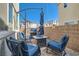 Charming patio with comfortable seating, a grill, and a cozy fire pit for outdoor entertaining at 2773 Frosted Teal Ave, North Las Vegas, NV 89086