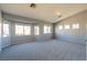 Spacious bonus room with lots of windows and natural light at 304 Iron Summit Ave, North Las Vegas, NV 89031