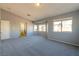 Large bonus room with many windows at 304 Iron Summit Ave, North Las Vegas, NV 89031