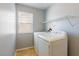 Laundry room featuring modern washer and dryer and neutral flooring at 304 Iron Summit Ave, North Las Vegas, NV 89031