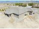 Rear aerial view of home construction showcasing backyard and roof at 3050 Oakridge Ave, Pahrump, NV 89048