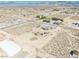 Wide aerial view of desert home with expansive property, pool and shop at 3050 Oakridge Ave, Pahrump, NV 89048