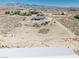 Expansive aerial view of property and adjacent properties with mountain backdrop at 3050 Oakridge Ave, Pahrump, NV 89048