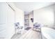 Bright bathroom with freestanding tub, walk-in shower, and modern fixtures at 3050 Oakridge Ave, Pahrump, NV 89048