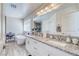 Bathroom with dual vanities, a soaking tub, and a bright, spacious layout at 3050 Oakridge Ave, Pahrump, NV 89048