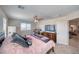 Bedroom featuring a comfy bed, natural light, and relaxing decor at 3050 Oakridge Ave, Pahrump, NV 89048