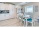 Charming dining area with white cabinetry, a hutch, and seating for six at 3050 Oakridge Ave, Pahrump, NV 89048