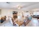Inviting living room showcasing a fireplace, ceiling fan, and comfortable seating arrangement at 3050 Oakridge Ave, Pahrump, NV 89048