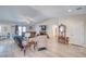 Expansive living room with luxury flooring, comfortable seating, and abundant natural light at 3050 Oakridge Ave, Pahrump, NV 89048