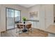 Bright dining area with sliding glass doors leading to the patio at 3354 Via Strada St, Henderson, NV 89044