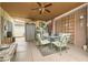 Covered patio area with a dining table and chairs for outdoor enjoyment at 3473 Conough Ln, Las Vegas, NV 89129