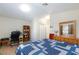 Bedroom with a queen bed, desk and chair, offering a comfortable and functional space for living at 3660 Renovah St # 201, Las Vegas, NV 89129