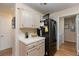 Compact kitchen with all necessary appliances and ample cabinet space at 3660 Renovah St # 201, Las Vegas, NV 89129