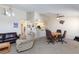 Open-concept living and dining space with a kitchen view at 3660 Renovah St # 201, Las Vegas, NV 89129