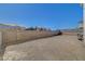 Large backyard with a brick border and block wall at 3747 Gulliver St, Las Vegas, NV 89115