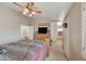 Comfortable bedroom with ceiling fan, closet, and access to the bathroom at 3747 Gulliver St, Las Vegas, NV 89115