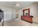 Bright bedroom with a ceiling fan, wardrobe, dresser and a rug on the carpet at 3747 Gulliver St, Las Vegas, NV 89115