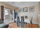 Dining room with a sliding glass door, dining table, and seating for six people at 3747 Gulliver St, Las Vegas, NV 89115