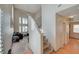 Inviting entryway with soaring ceilings, staircase, and views into the living room at 3747 Gulliver St, Las Vegas, NV 89115