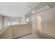 Hallway with overhead lighting, neutral colors, and doorways to various rooms at 3747 Gulliver St, Las Vegas, NV 89115