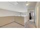 Open hallway with neutral walls and plush carpeting at 3747 Gulliver St, Las Vegas, NV 89115