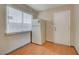 Side view of kitchen with refrigerator and door at 3747 Gulliver St, Las Vegas, NV 89115