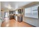Bright kitchen with ample counter space, wood look floors, and stainless steel appliances at 3747 Gulliver St, Las Vegas, NV 89115