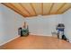 Spacious storage room with laminate floor and exposed ceiling beams at 3747 Gulliver St, Las Vegas, NV 89115