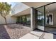 Exterior courtyard featuring desert landscaping, stone pavers and a modern aesthetic at 4135 N Durango Dr, Las Vegas, NV 89129